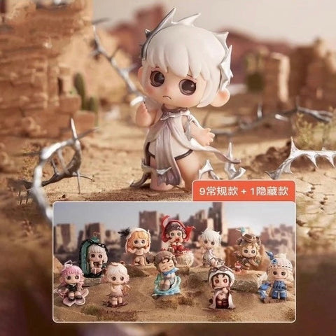 A display of the OONA: The Last Forsaken Land Series blind boxes features a central figure with white hair and thorn-like accessories standing in a desert ruin. Below, all nine main figures plus one hidden chaser are shown together, each with unique mystical designs symbolizing survival, struggle, and fantasy in a barren landscape.