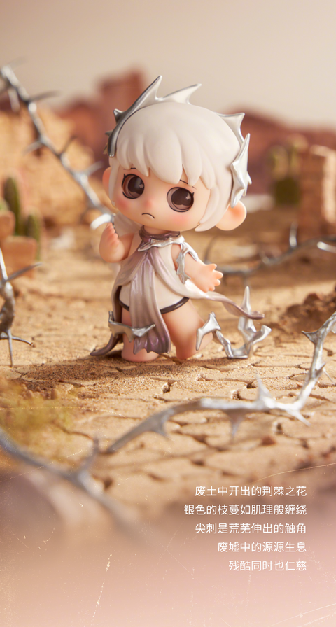 A white-haired OONA figurine stands barefoot in desert ruins, surrounded by sharp, silvery thorn branches. The figure’s worried expression contrasts with the harsh, spiked environment, symbolizing struggle and survival in the wasteland.