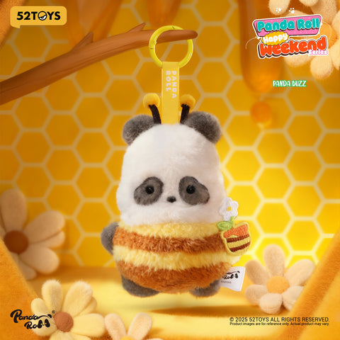 A panda in a fuzzy bee costume with yellow and brown stripes, antennae, and a flower accessory.
