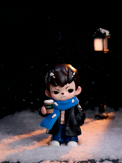 A figure with black hair and a gray streak sits against a concrete wall. Wearing a purple jacket over a white shirt, the character holds a blue cup labeled “tnt” and looks forward with a relaxed, cool expression.