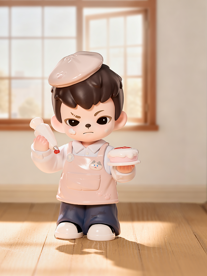 A brown-haired figure in a pale pink apron holds a small frosted cake and a piping bag. Wearing a white shirt and blue pants, the figure stands in a warmly lit kitchen near a window, sunlight streaming across the wooden floor.