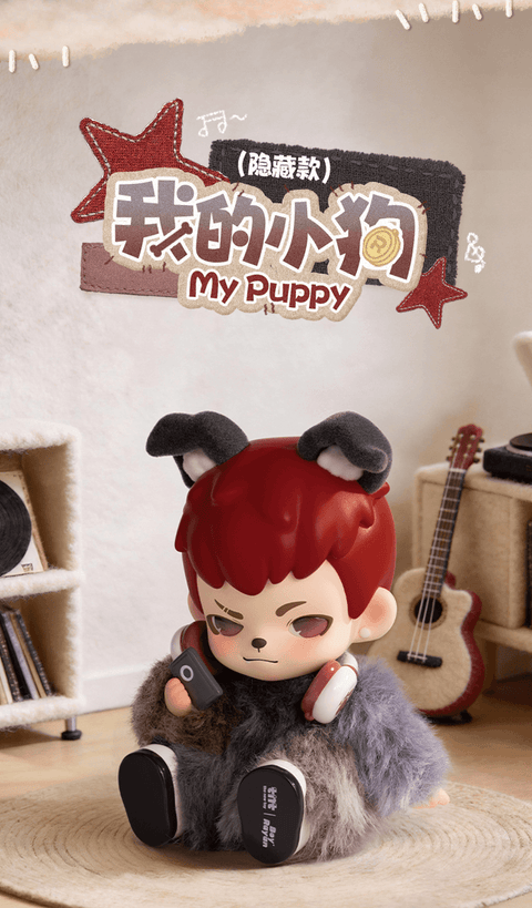 The rare hidden chaser featuring Rayan with vibrant red hair, a dark gray textured puppy suit, and headphones, sitting on a rug with a guitar in the background.