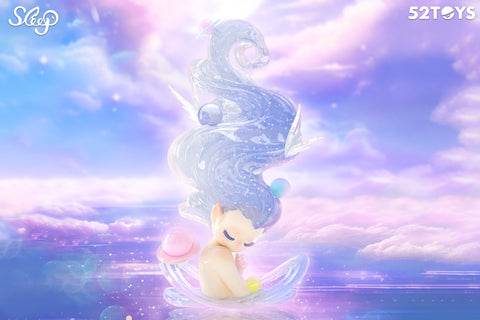 A magical figurine from 52TOYS’ Sleep series sits curled up on a translucent crescent base, surrounded by a dreamy pastel sky. The character’s shimmering, spiraled hair towers above, studded with tiny planets, stars, and rings, evoking a cosmic theme. With closed eyes and a peaceful expression, the figure floats against a glowing, cloud-filled background, blending celestial wonder with gentle serenity.