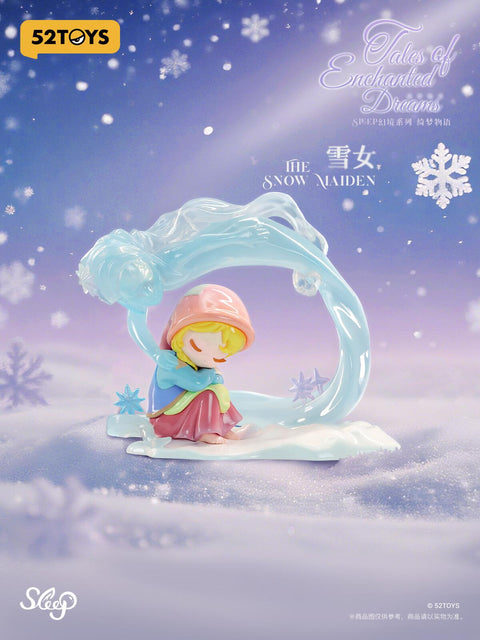 A delicate elf with blonde hair in a red hood sits curled in the snow as a swirling icy spirit arcs protectively around her. Frosted blue and white tones shimmer with snowflakes falling gently across the scene. The figurine captures both fragility and resilience, blending winter’s chill with warmth and fairy-tale wonder.