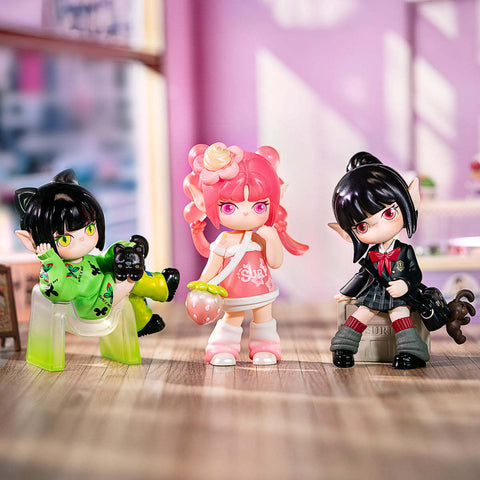 Three stylish Suri girls: Lazy Cat lounging in neon green, Snow Berry with strawberry accessory in pink, and School Girl in black uniform with red tie and cat companion, posed indoors.