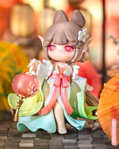 The Lantern Girl Suri in a flowing teal and salmon gown, holding a traditional red lantern decorated with cherry blossoms.