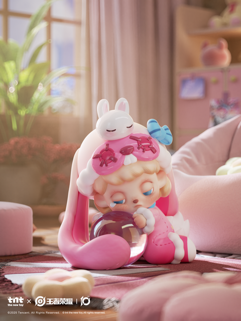 A soft pink-toned figure with curled hair and long bunny ears sits sleepily in a cozy room. Wearing a pink jumpsuit with a bunny hood, the character leans on a glass orb beside plush furniture and sunlit curtains, surrounded by pastel tones and gentle morning light.