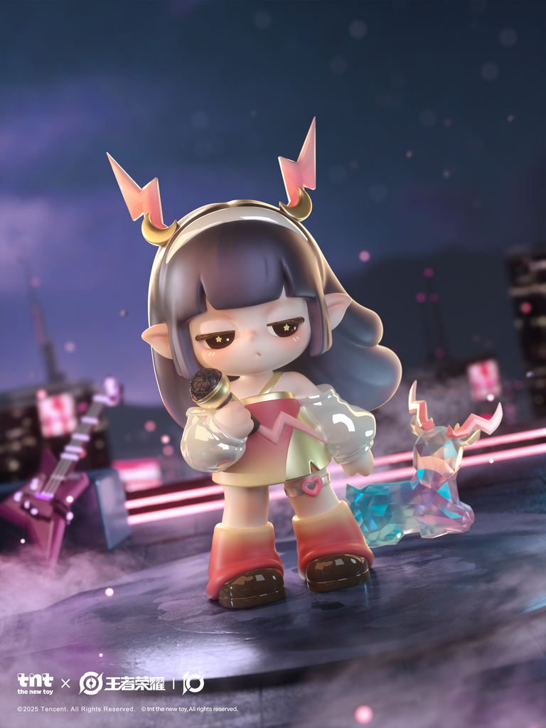 A lavender-haired character dressed as a starry wizard sits among clouds with a rainbow-striped cat companion. The figure wears a shimmering hat with a green star and translucent layered clothing, surrounded by glowing crystals and floating lights.