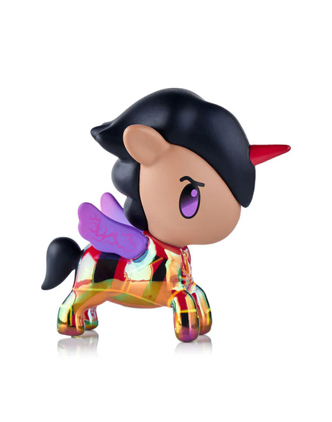 A Unicorno styled after Silco features a reflective, multicolored chrome body with a patchwork of red, gold, black, and green tones. The figure has a black mane, red horn, and small purple wings. Its stance is forward-leaning, highlighting the glossy, fragmented pattern across the legs and torso.