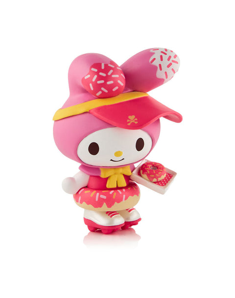 A pink My Melody figure wearing a red visor and a large pink-frosted donut with sprinkles as an inner tube, holding a small square tray with a matching donut.