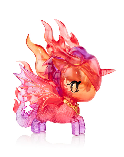 This image shows the Tokidoki Unicorno Mystical Dragon “Volcanic Dragon,” a red and purple translucent chaser design featuring molten flame details on its mane, wings, and tail. Gold accents appear on its chain necklace, and its scaled body is posed cleanly against a white background.